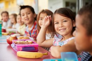 Kids eating at a lunch table